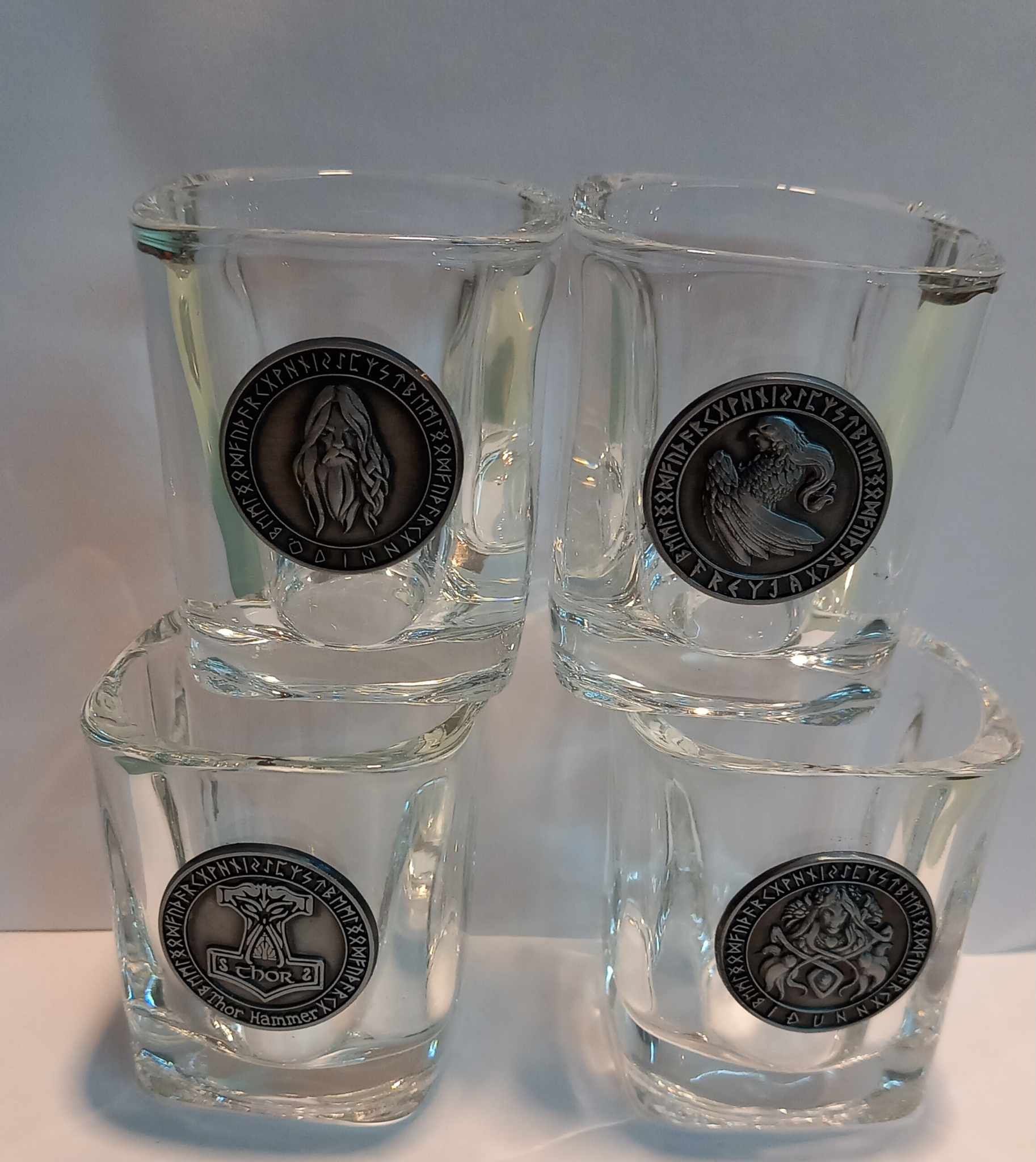 Shot glass with stainless steel designs Shot glass with stainless steel designs